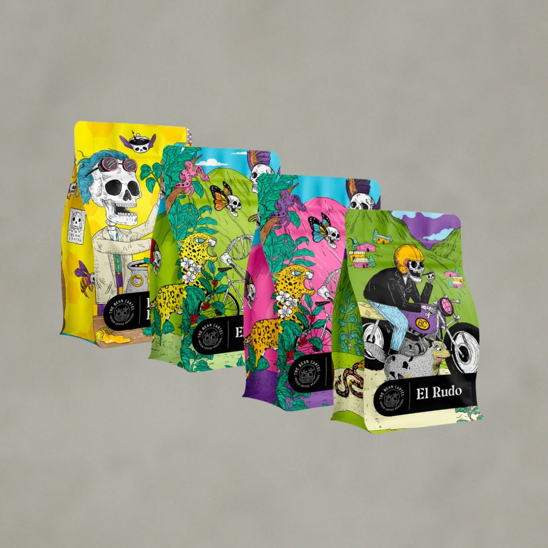 Four colorful bags of coffee displayed against a neutral background, each with a distinctive design and labeled with different coffee names: Dr Chan's Elixir, El Capitãn, La Patrona, and El Rudo.