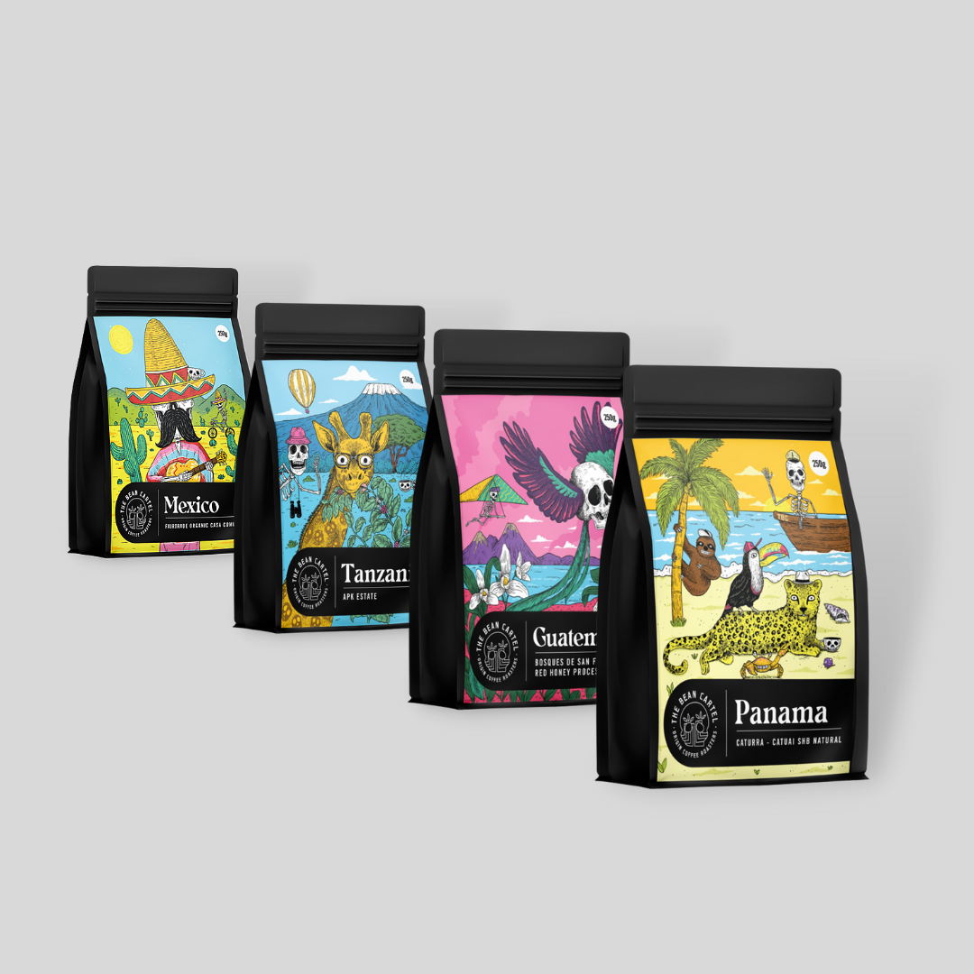 Four bags of coffee with illustrated labels depicting different animals and landscapes, representing different coffee origins.